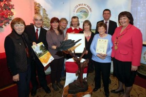 Smiling faces all round as we receive our trophy.